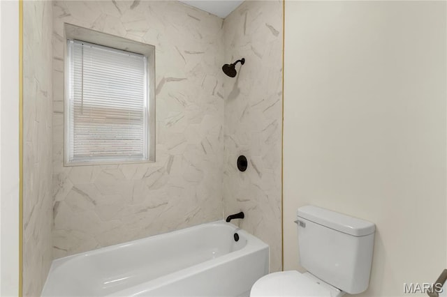 bathroom with toilet and tub / shower combination