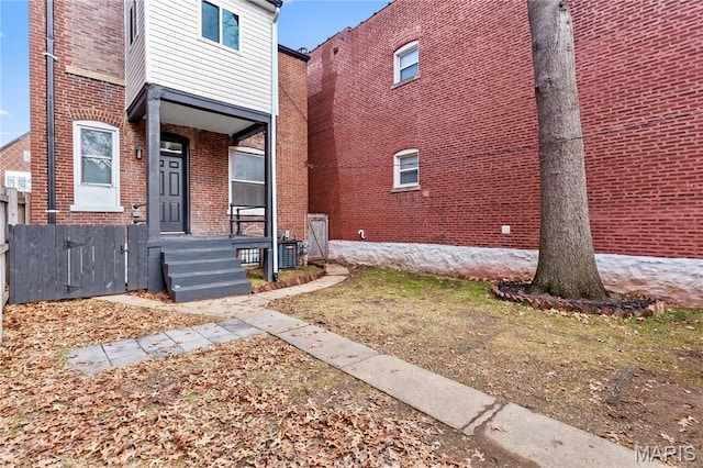view of front of house with brick siding