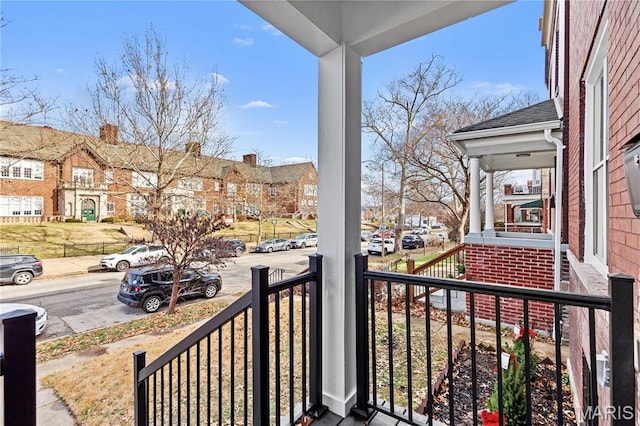 balcony featuring a porch