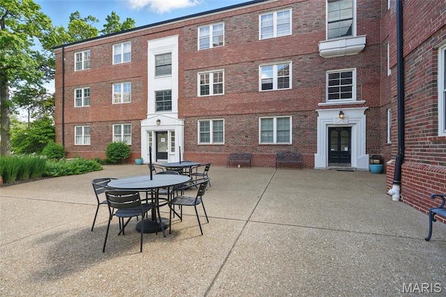 923 S Hanley Rd Unit A, Saint Louis, MO 63105 - view of patio / terrace featuring outdoor dining area