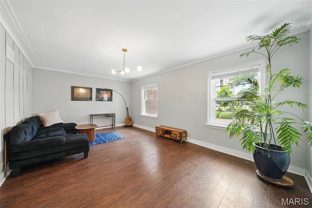 923 S Hanley Rd Unit A, Saint Louis, MO 63105 - living area featuring healthy amount of natural light, crown molding, wood finished floors, and baseboards