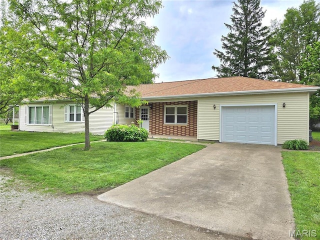 single story home with an attached garage, driveway, and a front yard