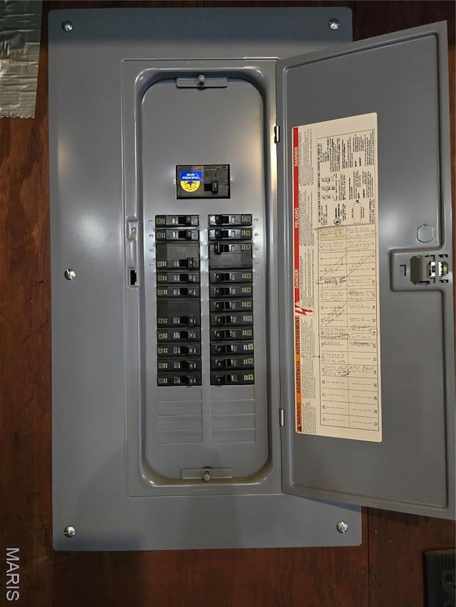 utility room featuring electric panel