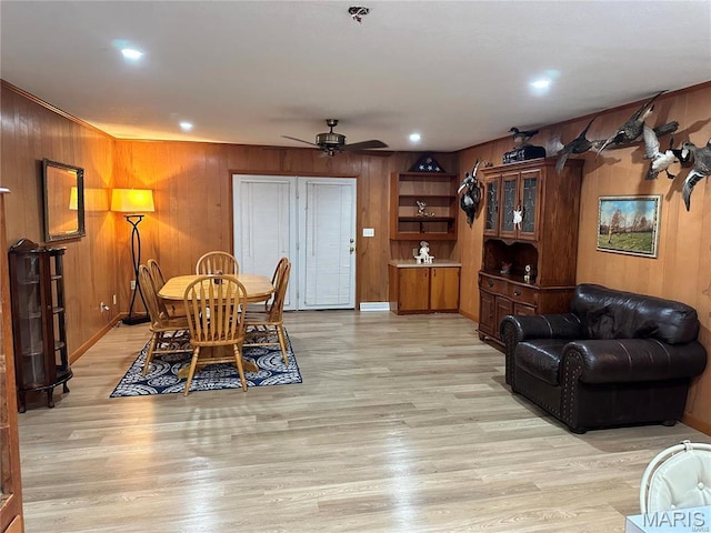 634 N 425th Rd, Bertrand, MO 63823 - dining area featuring wood walls, light wood-style flooring, ceiling fan, and recessed lighting