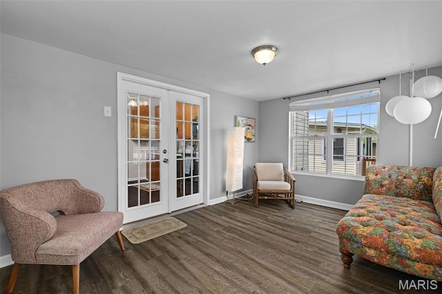 6211 Odell St, Saint Louis, MO 63139 - sitting room with french doors, wood finished floors, and baseboards
