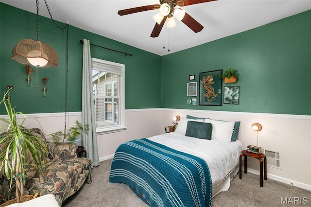6211 Odell St, Saint Louis, MO 63139 - bedroom with carpet floors, baseboards, and a ceiling fan