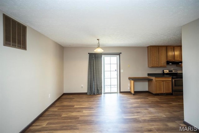 15625 Talon Ln, Saint Robert, MO 65584 - kitchen with stainless steel range with electric stovetop, under cabinet range hood, dark wood-type flooring, baseboards, and dark countertops