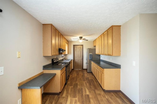 15625 Talon Ln, Saint Robert, MO 65584 - kitchen with electric range oven, a textured ceiling, ceiling fan, dark countertops, and dark wood-type flooring