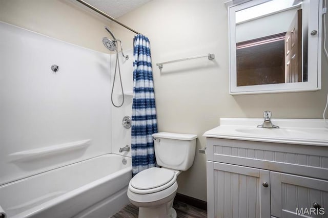 15625 Talon Ln, Saint Robert, MO 65584 - bathroom with toilet, vanity, shower / tub combo, wood finished floors, and baseboards