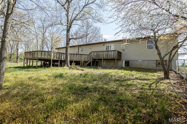 15625 Talon Ln, Saint Robert, MO 65584 - back of house featuring a wooden deck and fence