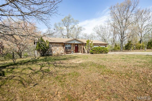 15625 Talon Ln, Saint Robert, MO 65584 - view of front of property with stone siding and a front lawn