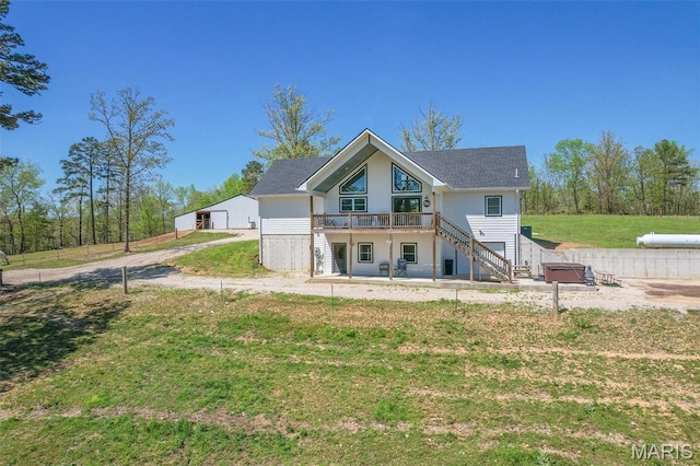 176 Carter 205, Van Buren, MO 63965 - back of property featuring stairs, a yard, a wooden deck, and dirt driveway