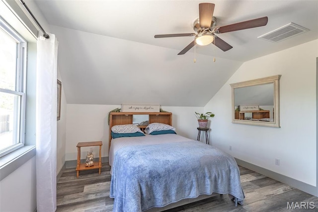 176 Carter 205, Van Buren, MO 63965 - bedroom featuring wood finished floors, vaulted ceiling, a ceiling fan, and baseboards
