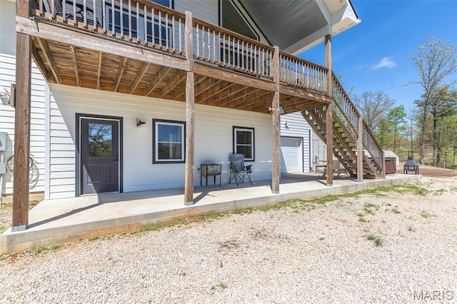 176 Carter 205, Van Buren, MO 63965 - property entrance featuring a patio area and a wooden deck