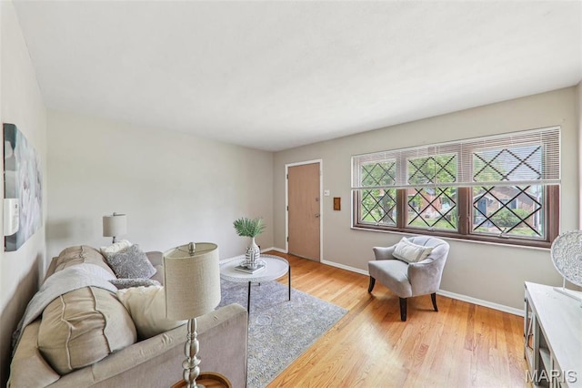 4116 Parker Ave, Saint Louis, MO 63116 - living room with baseboards and light wood finished floors