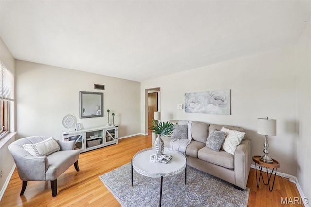 4116 Parker Ave, Saint Louis, MO 63116 - living room with wood finished floors and baseboards