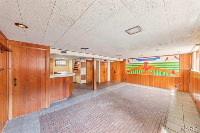 4116 Parker Ave, Saint Louis, MO 63116 - below grade area with wooden walls and bar