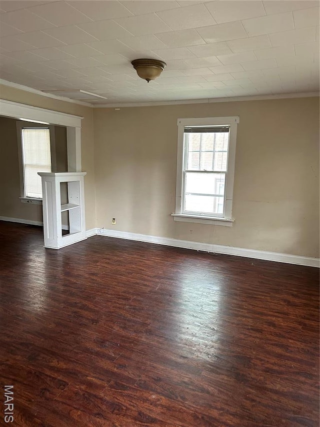 122 Fermo Ave, Ferguson, MO 63135 - empty room featuring ornamental molding, dark wood-style floors, and baseboards