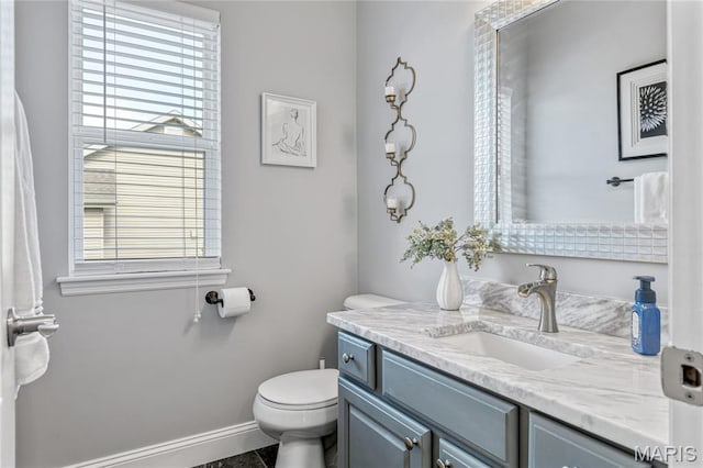 2 Pearview Ct, Saint Peters, MO 63376 - bathroom with vanity, toilet, plenty of natural light, and baseboards