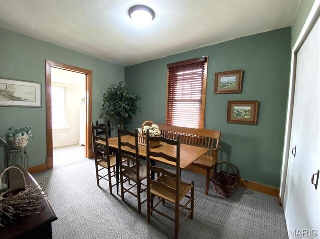 104 E 12th St, Hermann, MO 65041 - dining room featuring baseboards and carpet