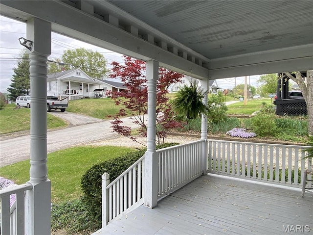 104 E 12th St, Hermann, MO 65041 - wooden terrace featuring a porch