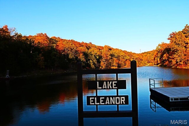2025 Moat Ln Unit 1513, Marthasville, MO 63357 - dock with a wooded view and a water view