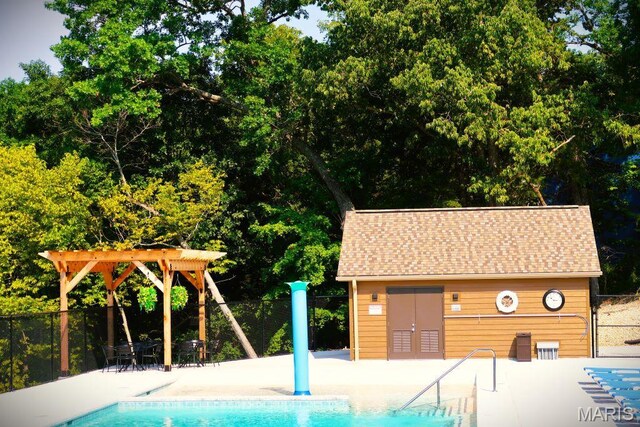 2025 Moat Ln Unit 1513, Marthasville, MO 63357 - view of swimming pool featuring a patio and an outdoor structure