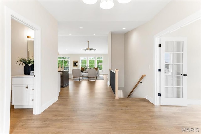 2217 Valleyview Dr, Barnhart, MO 63012 - corridor with an upstairs landing, light wood-style flooring, recessed lighting, and baseboards