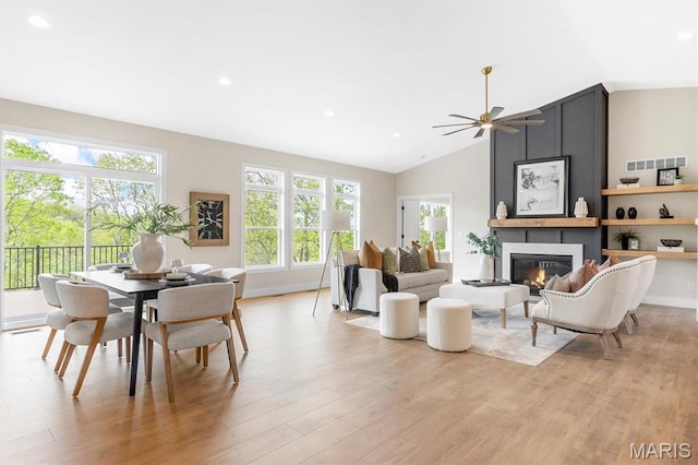 2217 Valleyview Dr, Barnhart, MO 63012 - living room featuring vaulted ceiling, a fireplace, light wood-style flooring, recessed lighting, and ceiling fan