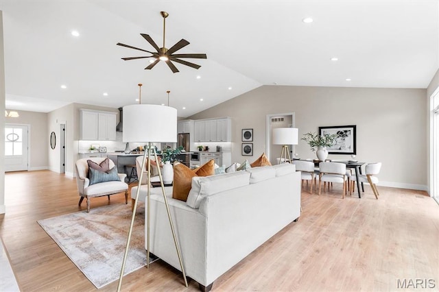 2217 Valleyview Dr, Barnhart, MO 63012 - living area featuring vaulted ceiling, a ceiling fan, light wood finished floors, baseboards, and recessed lighting