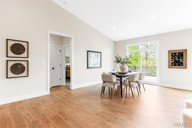 2217 Valleyview Dr, Barnhart, MO 63012 - dining room featuring light wood-style floors, baseboards, recessed lighting, and high vaulted ceiling