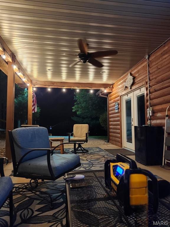 view of patio featuring french doors and ceiling fan