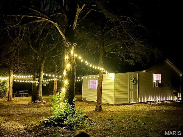 6423 Cedar Lake Dr, Bonne Terre, MO 63628 - view of yard at twilight