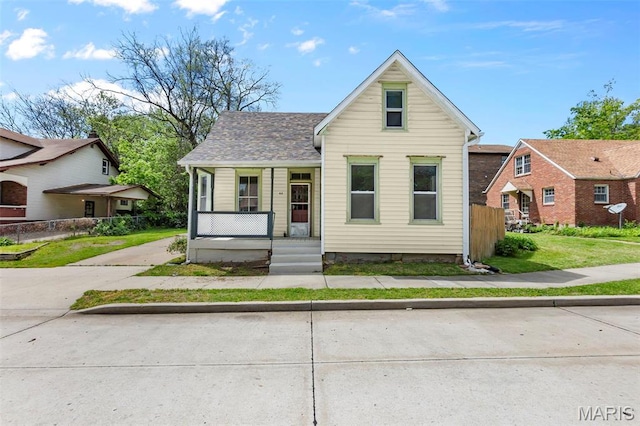 63 N Hanover St, Cape Girardeau, MO 63701 - view of front of property with a porch and fence