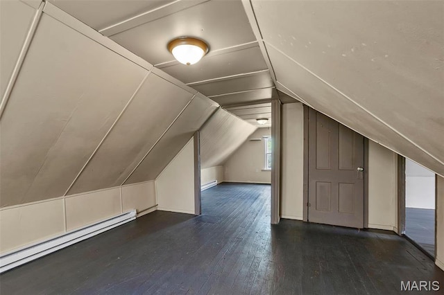 63 N Hanover St, Cape Girardeau, MO 63701 - bonus room featuring dark wood finished floors, a baseboard heating unit, and vaulted ceiling