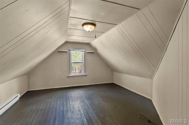63 N Hanover St, Cape Girardeau, MO 63701 - bonus room featuring a baseboard heating unit, wood-type flooring, vaulted ceiling, and baseboards