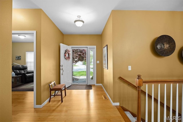 1674 Lakepointe Estates Dr, Ofallon, IL 62269 - foyer entrance featuring light wood-style flooring and baseboards