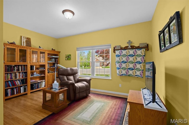 1674 Lakepointe Estates Dr, Ofallon, IL 62269 - sitting room with wood finished floors