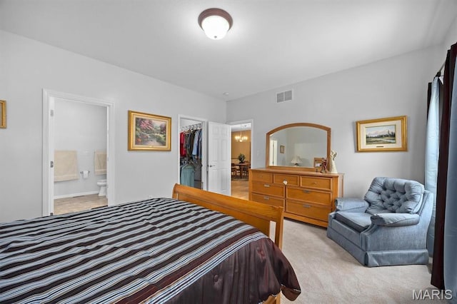 1674 Lakepointe Estates Dr, Ofallon, IL 62269 - bedroom with light carpet, a spacious closet, a closet, and connected bathroom