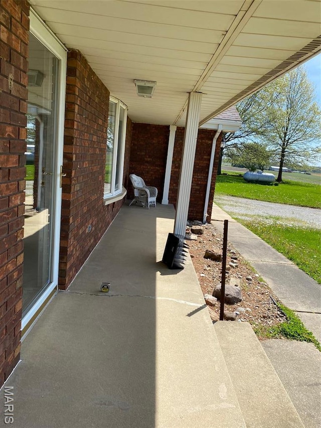 25127 N 16th Ave, Nokomis, IL 62075 - view of patio featuring a porch