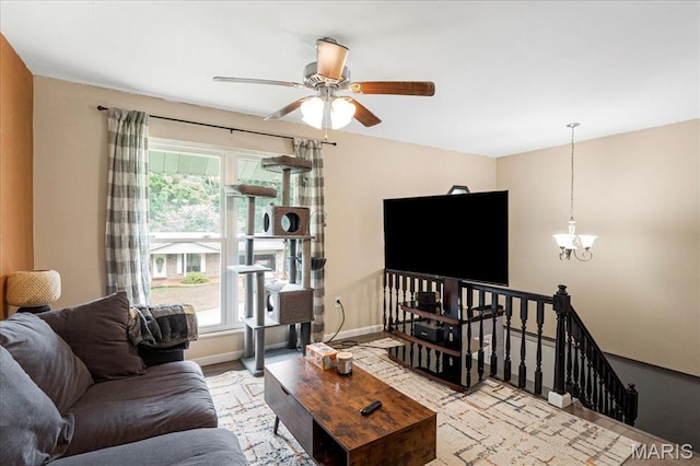 5553 Oak Pointe Dr, Imperial, MO 63052 - living area featuring a ceiling fan and a chandelier