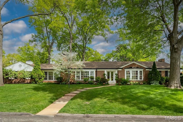 15 York Hills Dr, Saint Louis, MO 63144 - ranch-style home featuring a front lawn, brick siding, and french doors