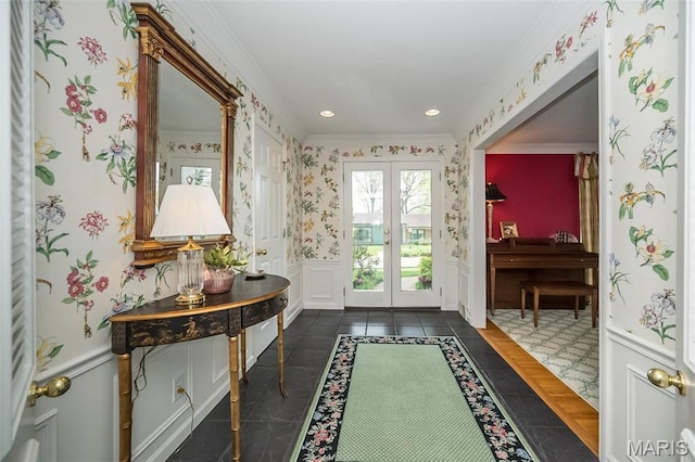 15 York Hills Dr, Saint Louis, MO 63144 - entryway with crown molding, wallpapered walls, french doors, wainscoting, and a decorative wall