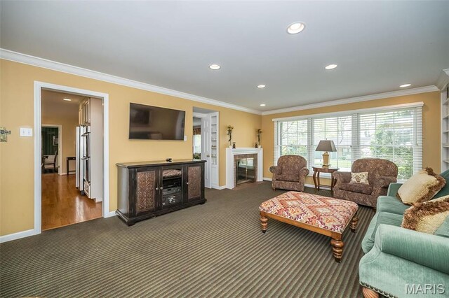 15 York Hills Dr, Saint Louis, MO 63144 - carpeted living area featuring a fireplace, recessed lighting, baseboards, crown molding, and plenty of natural light