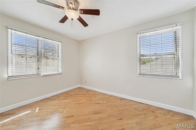 1521 Oriole Ln, Brentwood, MO 63144 - empty room with baseboards, wood finished floors, and a ceiling fan