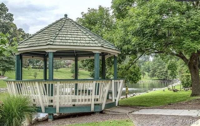 1521 Oriole Ln, Brentwood, MO 63144 - view of community featuring a gazebo, a yard, and a deck with water view