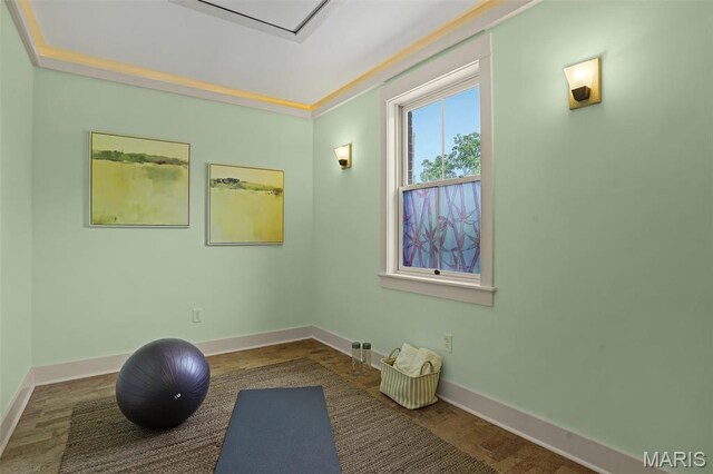 1201 Dolman St, Saint Louis, MO 63104 - exercise area with baseboards and wood finished floors