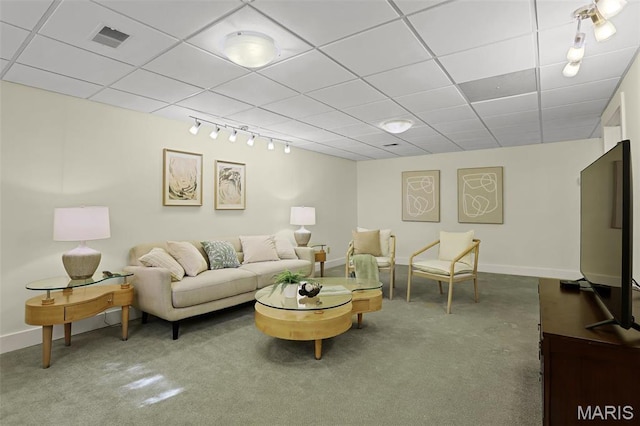 1201 Dolman St, Saint Louis, MO 63104 - living area with carpet flooring, baseboards, track lighting, and a drop ceiling
