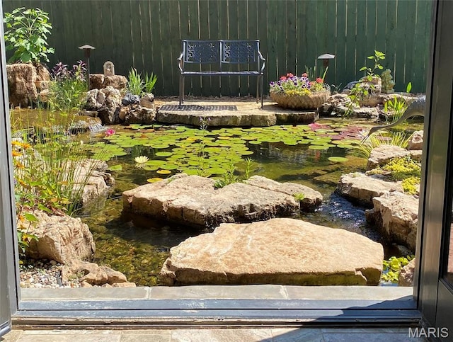 1201 Dolman St, Saint Louis, MO 63104 - view of yard featuring a small pond