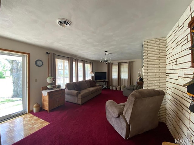 123 S Oak St, Nokomis, IL 62075 - carpeted living area featuring a chandelier